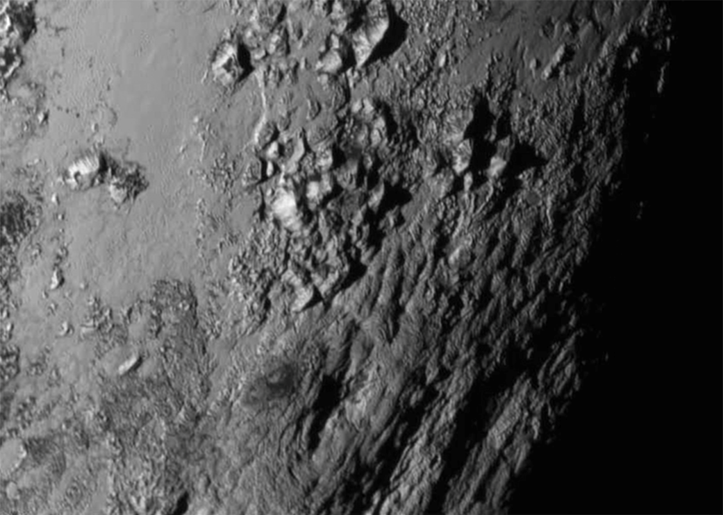 http://reho.st/pluto.jhuapl.edu/Multimedia/Science-Photos/pics/nh-plutosurface.png