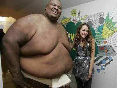 http://reho.st/preview/www.tshirtvip.com/blog/wp-content/uploads/2007/12/hannamontanas-son-plus-gros-fan.jpg