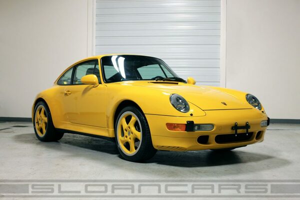https://reho.st/preview/www.sloanmotorcars.com/wp-content/uploads/2016/03/3142_1997_porsche_993_carrera_c2s_speed_yellow_yellow_wheels_web-921x614.jpg